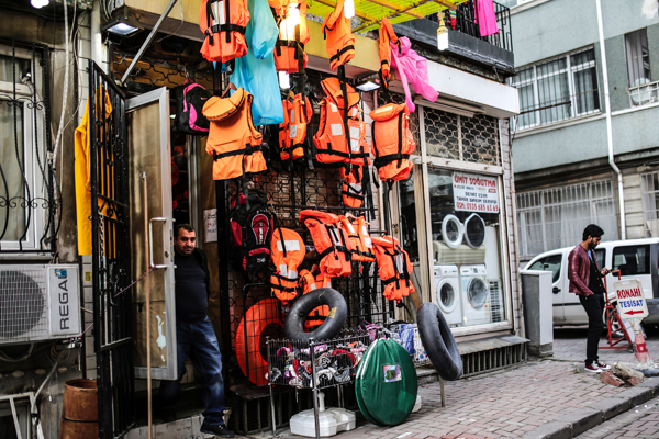 Life jackets, inner tubes of tyres and woolie hats are on sale at a store, in Kumkapi district of Istanbul, on Monday (AFP photo)